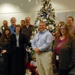 Secretary Ross (left, foreground) visits the staff at the department's Plant Pest Diagnostics Center.