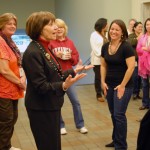 Secretary Ross chatting with employees in the lobby at CDFA headquarters