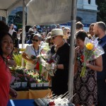 Handing out goodies from the California Egg Farmers, Association of Nurseries and Garcen Centers, and California State Floral Association