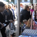 Attendees visit a milk booth at Ag Day