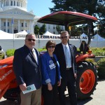 Secretary Ross with Michael O'Gorman of the Farmer Veteran Coalition and Todd Stucke with Kubota Tractor Company - California
