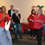 Division of Marketing Services employees singing