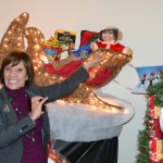Secretary Ross notices her photograph in a Santa's sleigh decoration