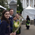 FFA members hand out flowers at the California State Floral Association booth