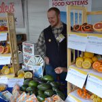 UC Agriculture and Natural Resources exhibit with various citrus fruits displayed