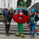 The California Fresh mascot posing for photos