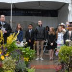 Jamie Johansson congratulates young contest winners